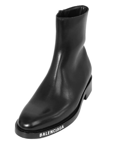 Shop Balenciaga Logo Ankle Boots In Black