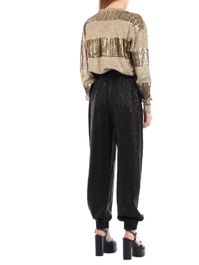 Shop Saint Laurent Lamè Knitted Trousers In Black