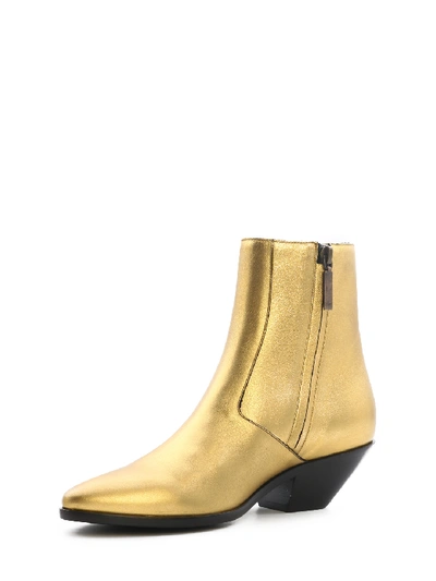 Shop Saint Laurent Boots West 45 Gold