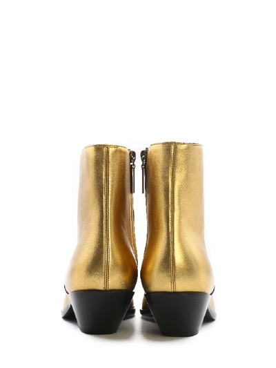 Shop Saint Laurent Boots West 45 Gold