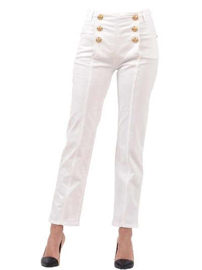 Shop Balmain Gold Buttons Jeans In White