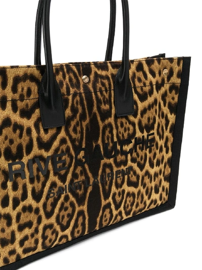 Shop Saint Laurent Rive Gauche Leopard Print Tote Bag In Brown