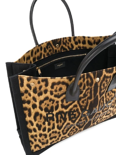 Shop Saint Laurent Rive Gauche Leopard Print Tote Bag In Brown