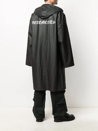 Shop Vetements Logo Raincoat In Black