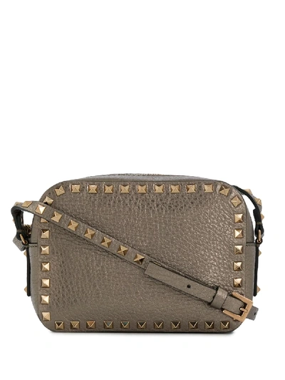 Shop Valentino Rockstud Leather Crossbody Bag In Grey