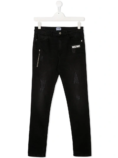 Shop Moschino Teen Distressed Skinny Jeans In Black