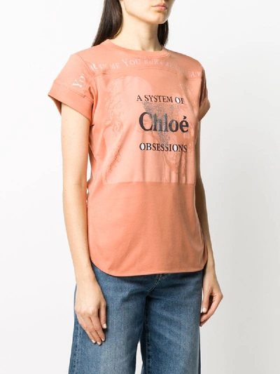 Shop Chloé Slogan-print Curved-hem T-shirt In Orange