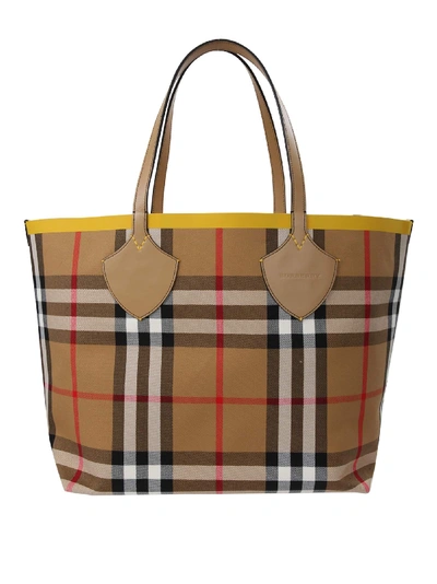 Shop Burberry Hand Bag In Yellow