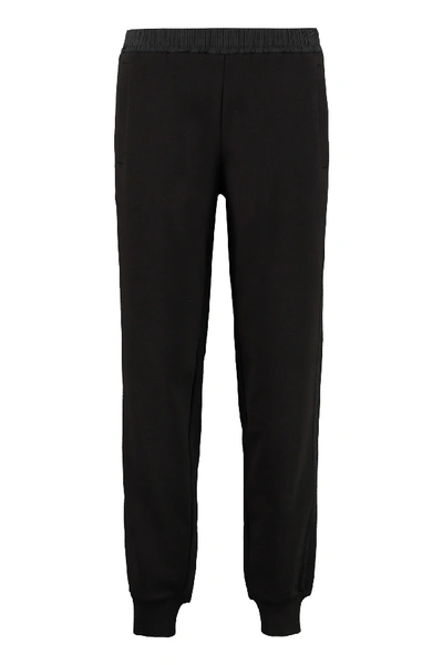 Shop Moncler Stretch Cotton Track-pants In Black