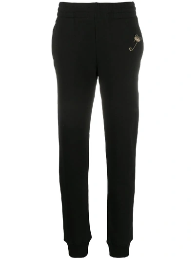 Shop Moschino Safety Pin Embellished Slim-fit Track Pants In Black