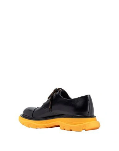 Shop Alexander Mcqueen Laced Shoes In Yellow