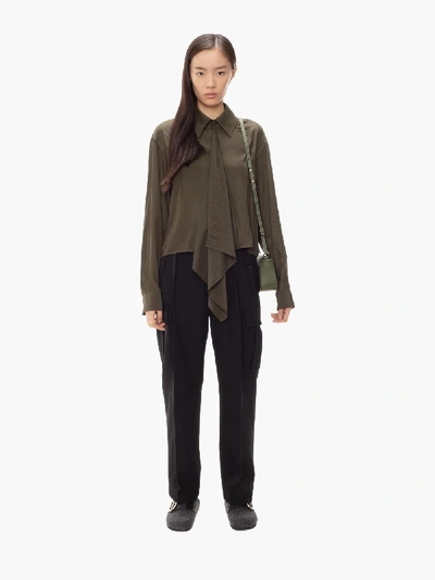 Shop Jw Anderson Double Hem Cargo Trousers In Black