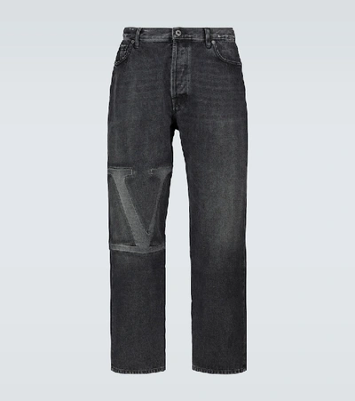 Shop Valentino Vltn Straight-fit Denim Jeans In Black