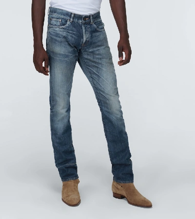 Shop Saint Laurent Slim-fit Washed Denim Jeans In Blue