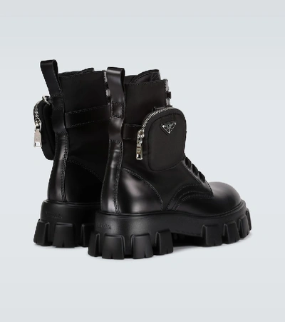Shop Prada Leather Combat Boots In Black