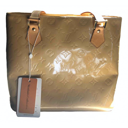beige patent leather handbag
