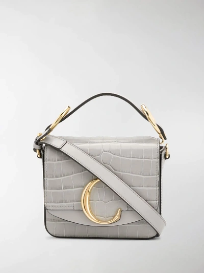 Shop Chloé Mini C Top Handle Bag In Grey