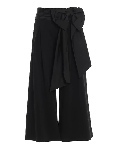 Shop Moschino Maxi Bow Palazzo Trousers In Black