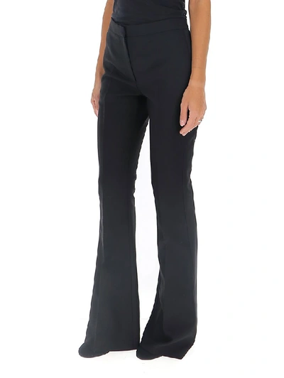 Shop Alexander Mcqueen High Rise Flared Pants In Black