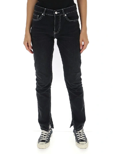 Shop Ganni Side Slit Jeans In Black