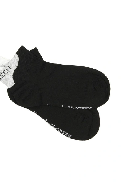 Shop Alexander Mcqueen Logo Motif Socks In Black