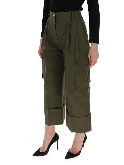 Shop Alexander Mcqueen Cropped Cargo Pants In Green