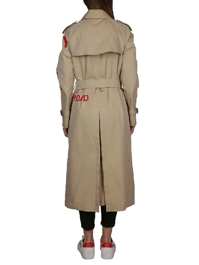 Shop Burberry Horseferry Print Trench Coat In Beige