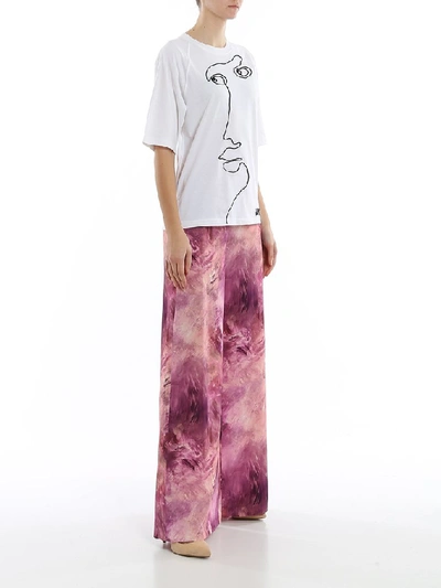 Shop Moschino Printed Wide Leg Pants In Multi
