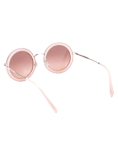 Shop Miu Miu Eyewear Round Frame Sunglasses In Pink