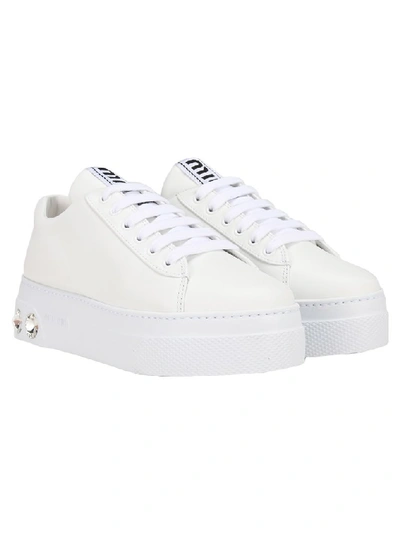 Shop Miu Miu Crystal Embellished Sneakers In White