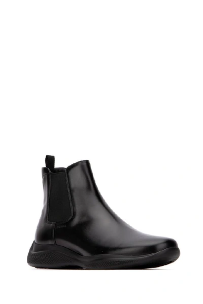 Shop Prada Logo Chelsea Ankle Boots In Black