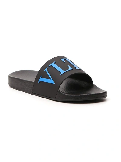 Shop Valentino Vltn Slides In Black