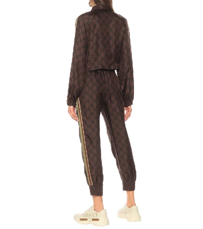 Shop Gucci Gg Supreme Silk-twill Sweatpants In Brown