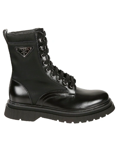 Shop Prada Side Logo Plaque Lace-up Boots In Black