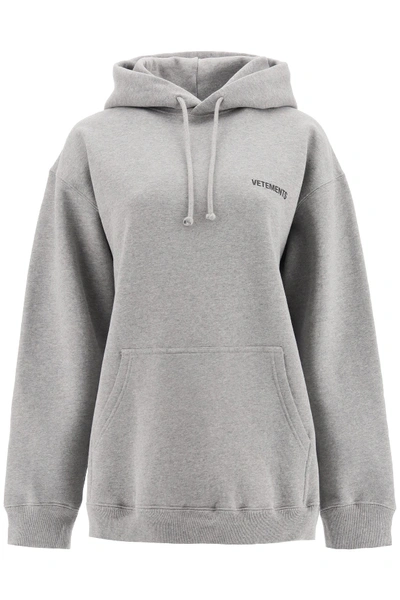 Shop Vetements Logo Print Hoodie In Grey (grey)