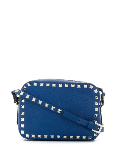 Shop Valentino Rockstud Leather Crossbody Bag In Blue