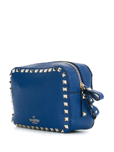 Shop Valentino Rockstud Leather Crossbody Bag In Blue