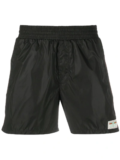 Shop Gucci Label Swim Shorts In Black