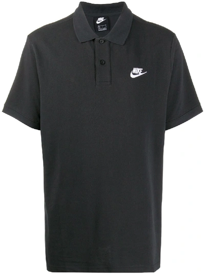 Shop Nike Relaxed-fit Polo Shirt In Black