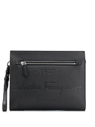 Shop Ferragamo Logo-debossed Leather Clutch In Black
