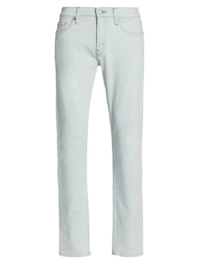 Shop J Brand Mick Skinny Jeans In Blanko