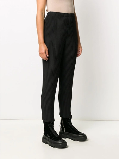 Shop Issey Miyake Pleated Trousers In Black