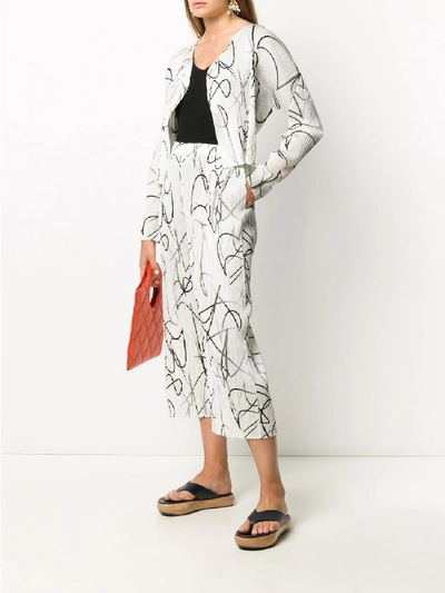 Shop Issey Miyake Trousers In White