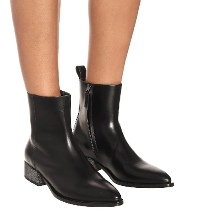 Shop Brunello Cucinelli Leather Ankle Boots In Black