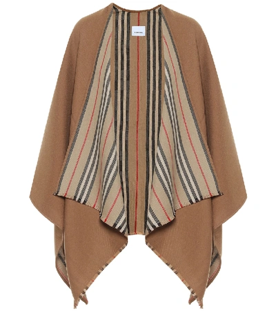 Shop Burberry Icon Stripe Wool Cape In Brown