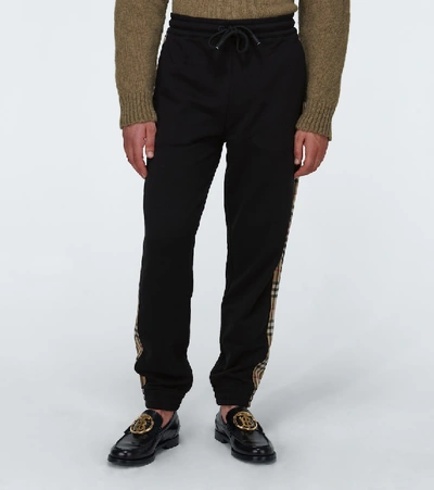 Shop Burberry Cotton Side-striped Sweatpants In Black