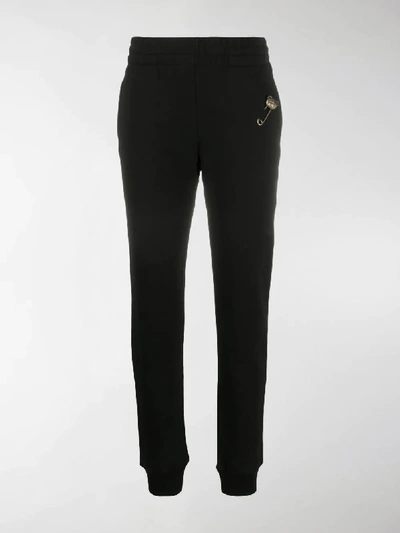 Shop Moschino Safety Pin Embellished Slim-fit Track Pants In Black