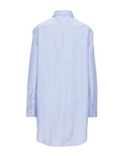 Shop Burberry Solid Color Shirts & Blouses In Sky Blue