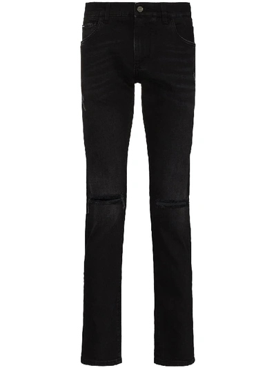 Shop Dolce & Gabbana Ripped Knee Slim Fit Jeans In Black