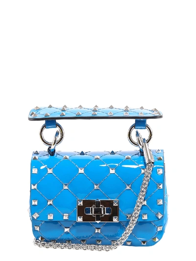 Shop Valentino Rockstud Quilted Mini Bag In Blue